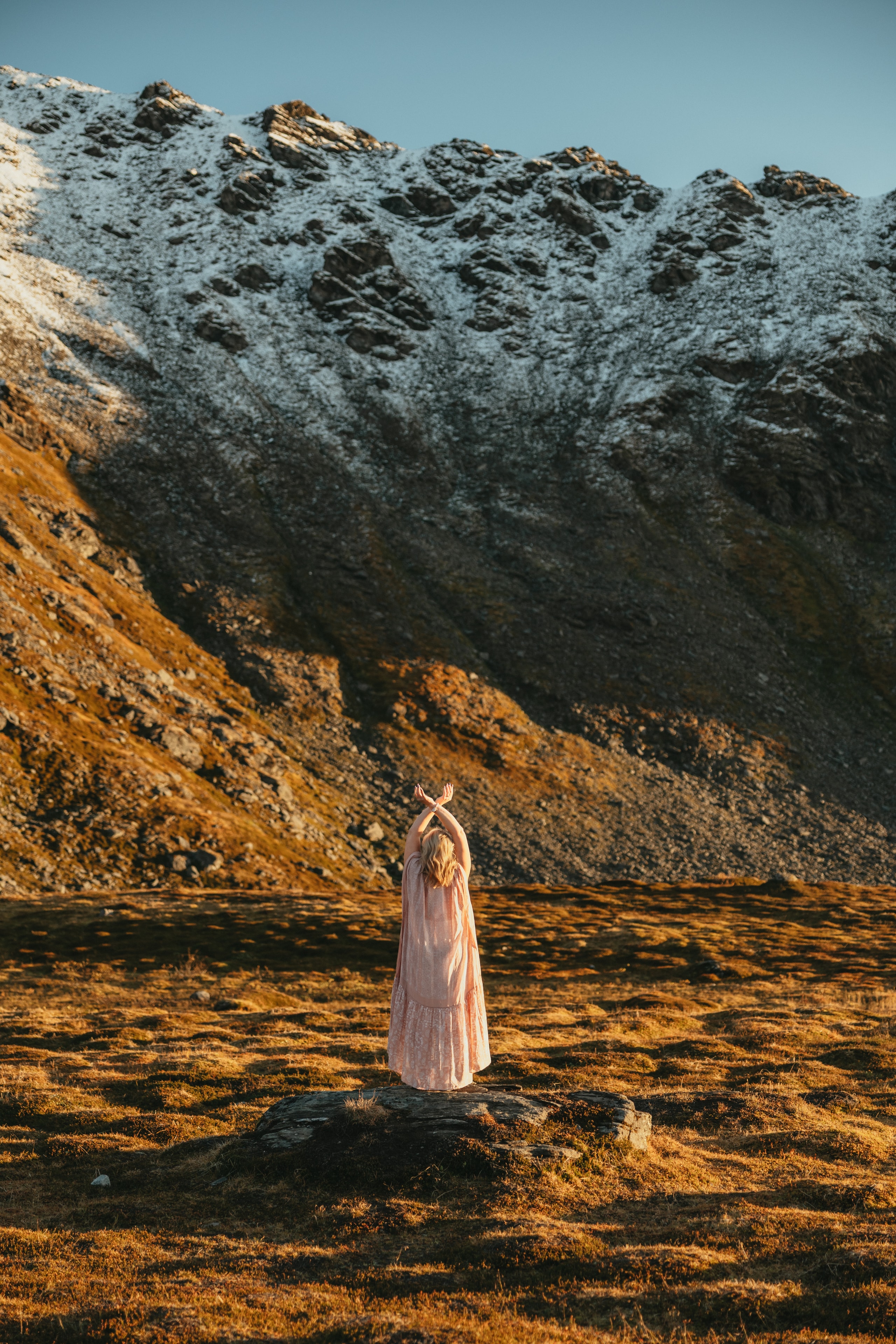Brand photography by Lena Lee — woman in white dress in a mountain valley